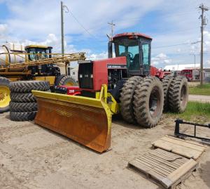 Case 9250 with Degelman 4-way blade